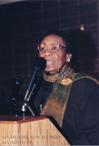 Virginia Bradley Moore, chair of the SRRT Dr. Martin Luther King, Jr. Holiday Task Force, speaking at the Martin Luther King, Jr. Holiday Observation and Sunrise Celebration at the 2001 ALA Midwinter Meeting in Washington, D.C.