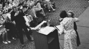 Clara Jones embracing Virginia L. Jones, after V. Jones received an Honorary Membership of ALA during the 1976 ALA Conference.