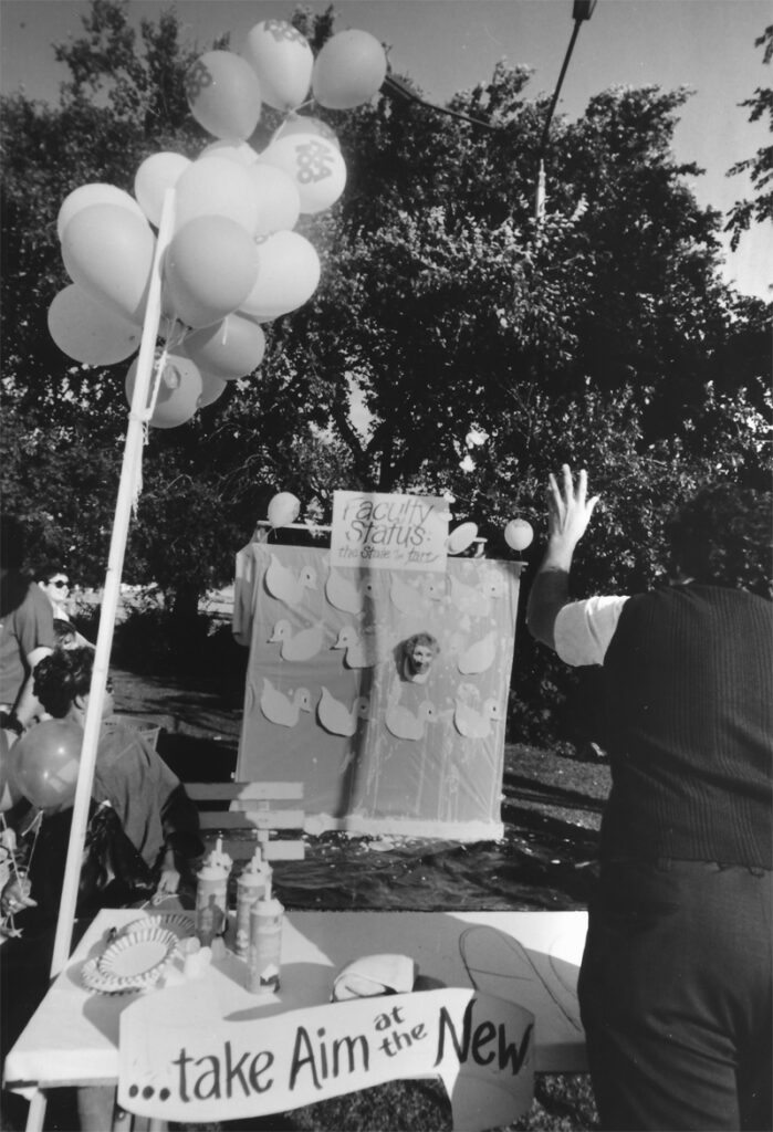Former ACRL president, Norm Tanis, at a pie throwing booth for ACRL's booth at the 1976 Annual Conference.
