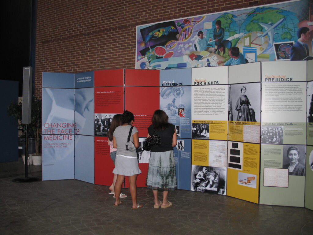 People enjoying the traveling exhibition, "Changing the Face of Medicine: Celebrating America’s Women Physicians," in 2005.