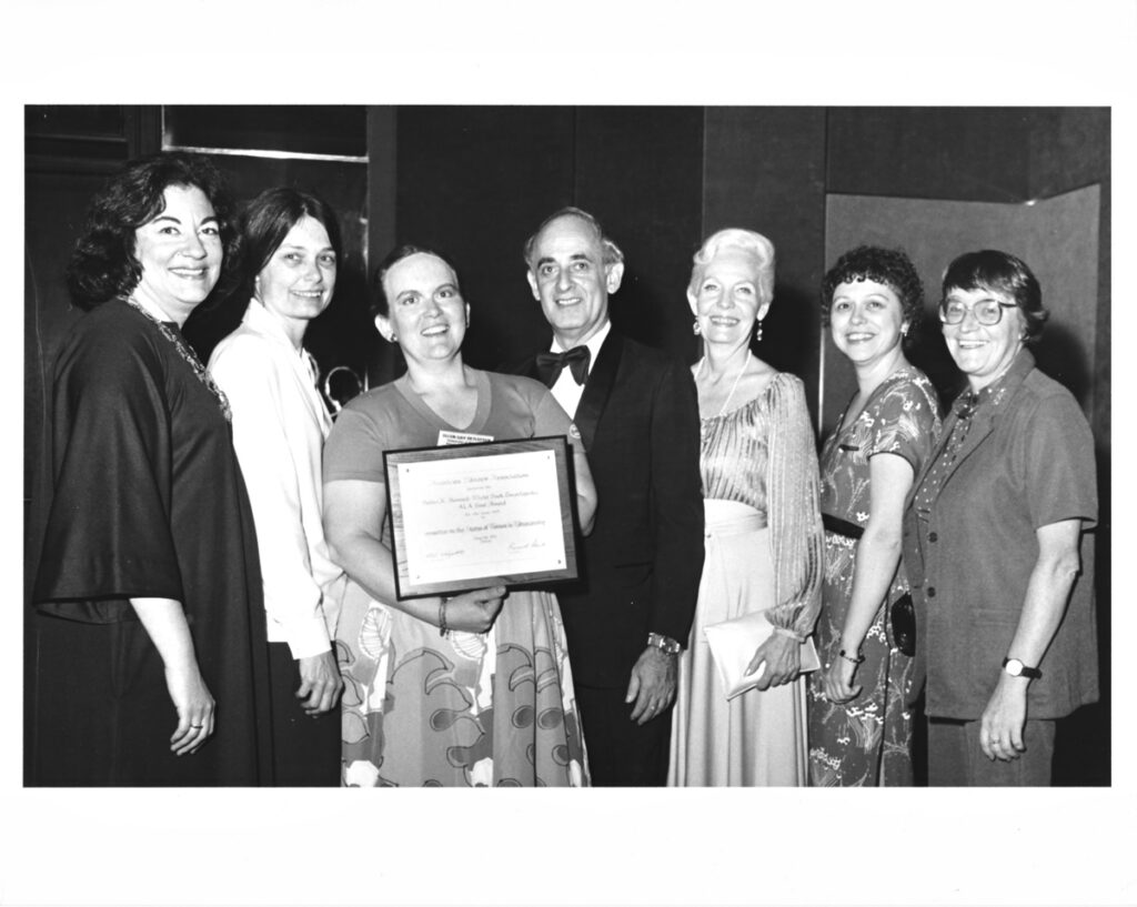 COSWL receiving an ALA Goal Award at 1979 Annual Conference. Pictured are Elizabeth Futas, Margaret Myers, Ellen Detlefsen, Russell Shank, Pat Rom and Joan Marshall