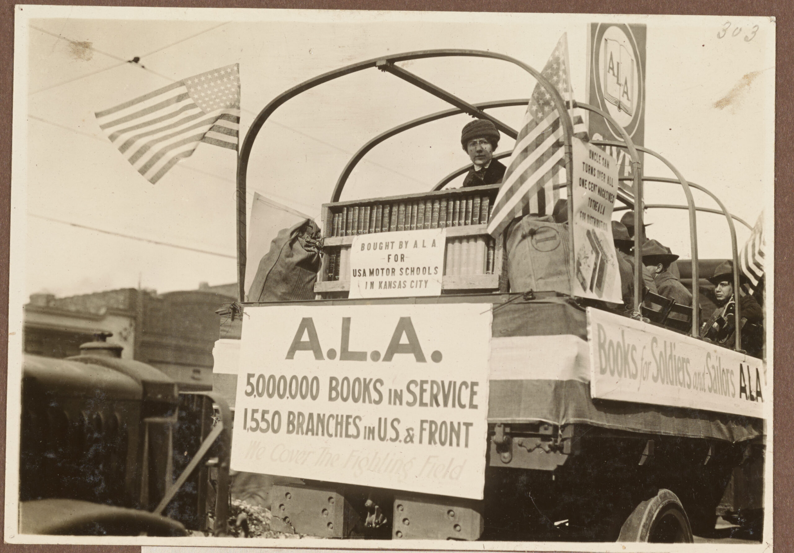 American Library Association parade float with servicemen riding inside for the United War Work Campaign; Kansas City, November 9, 1918.