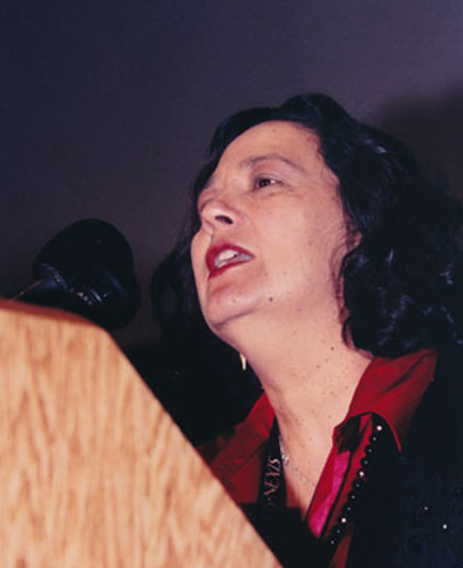 Oralia Garza de Cortés, President of REFORMA, speaking at the Martin Luther King, Jr. Holiday Observation and Sunrise Celebration at the 2001 ALA Midwinter Meeting in Washington, D.C.